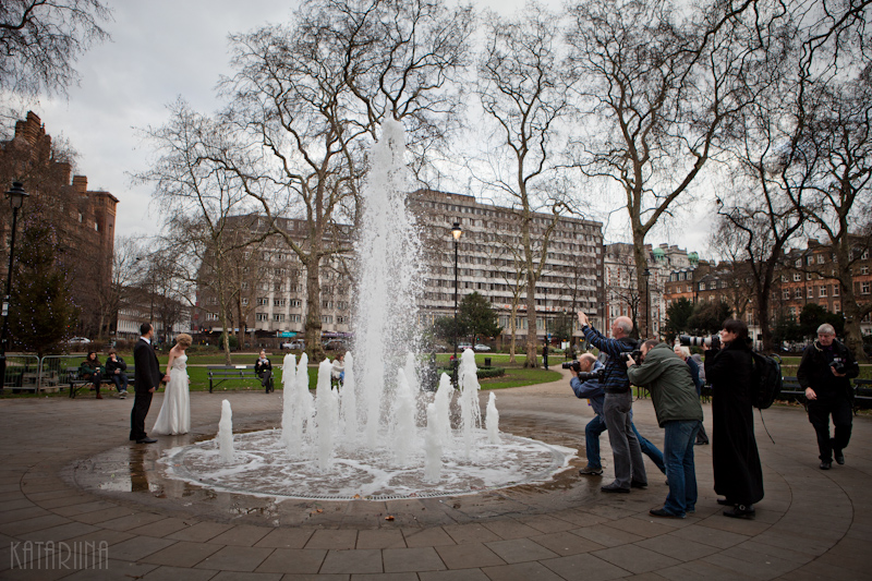 20120110134149-2 photographers shooting a wedding couple by a fountain on Russel Square